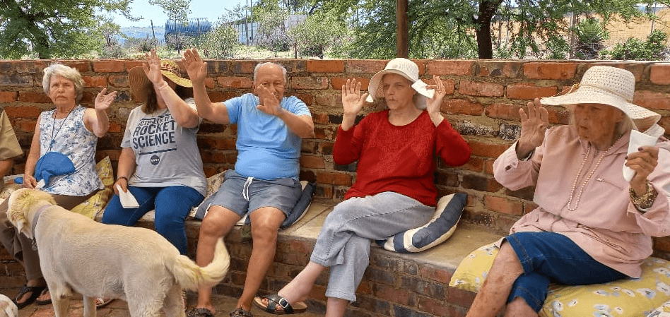 Dementia Residents at Resthill Memory Care Boma singing together